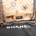Chanel Reissue Lucky Charms Mini in Pelle di Vitello Beige con Catena e Charm