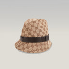 Gucci Cappello Bucket GG Beige in Tela Monogram con Fascia in Pelle Marrone