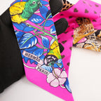 Hermès Twilly Jungle Love Love in Seta Rosa, Blu e Multicolore