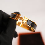 Hermès Clic H PM Bracciale in Smalto Nero con Finitura Placcata Oro Giallo