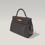 Hermès Kelly 32 Retourne in Pelle Martellata Nera con Hardware Dorato
