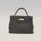 Hermès Kelly 32 Retourne in Pelle Martellata Nera con Hardware Dorato