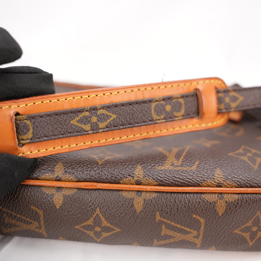 Louis Vuitton Pochette Accessoires Monogram in Tela Rivestita con Finiture in Pelle