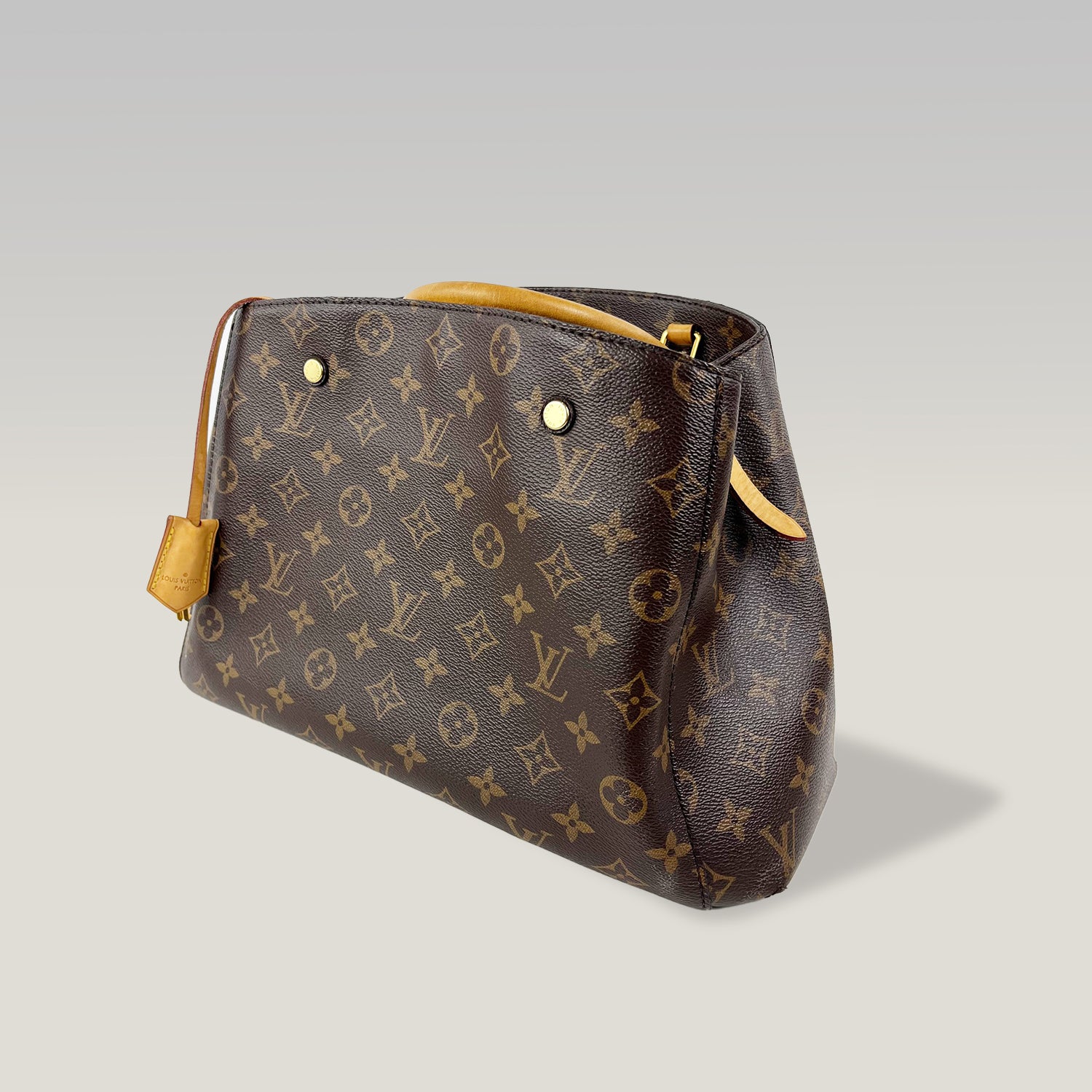 Borsa Louis Vuitton Montaigne MM in Tela Monogram Marrone con Manici in Pelle