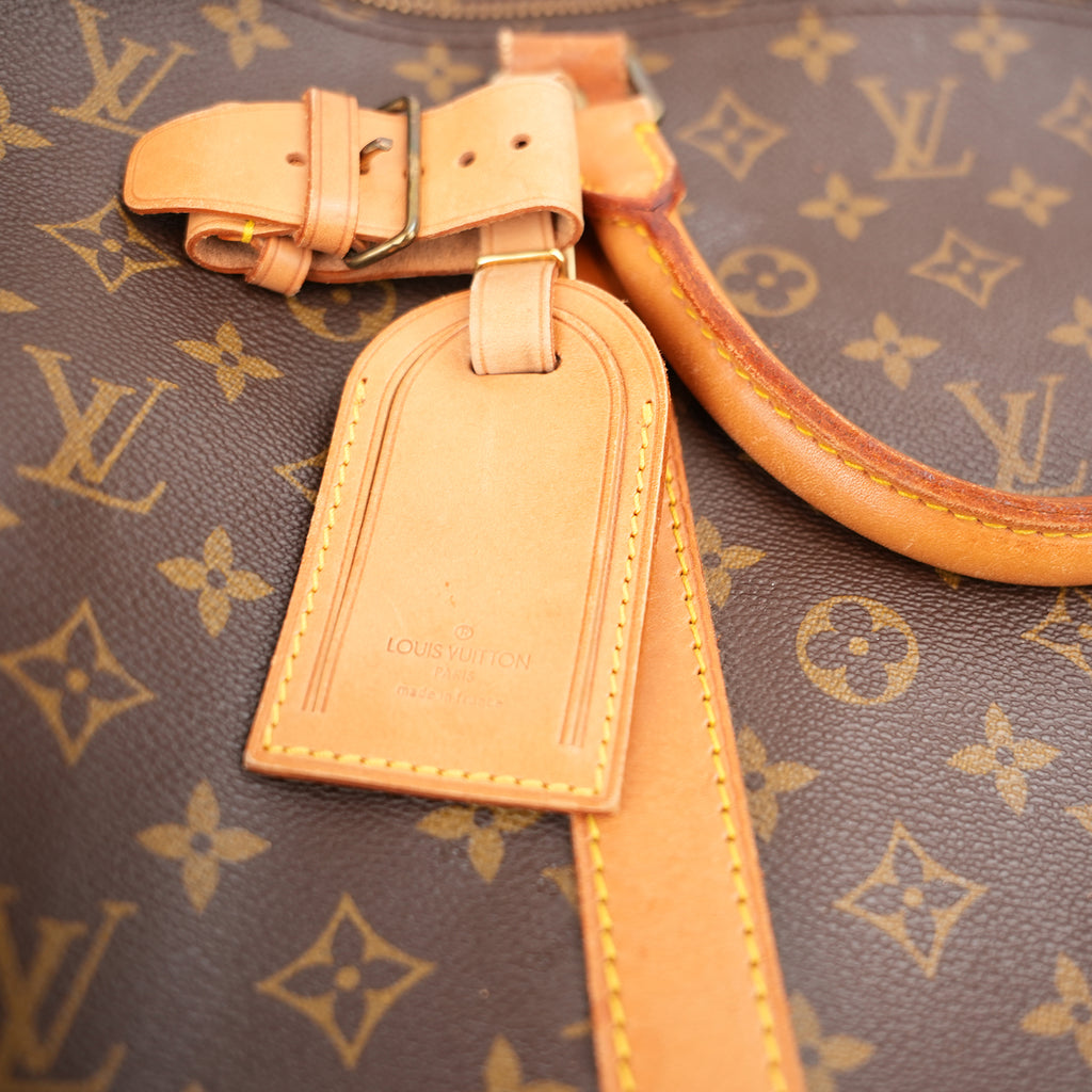 Louis Vuitton Sirius 60 Monogram – Borsa da Viaggio in Tela Rivestita e Pelle Vachetta