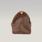 Louis Vuitton Sirius 60 Monogram – Borsa da Viaggio in Tela Rivestita e Pelle Vachetta