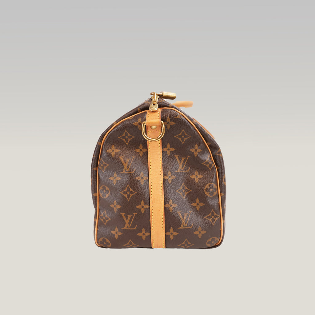 Louis Vuitton Speedy 35 Monogram – Borsa a Mano in Tela Rivestita e Pelle Vachetta